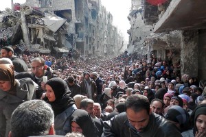 Refugees crowd in Sirian city